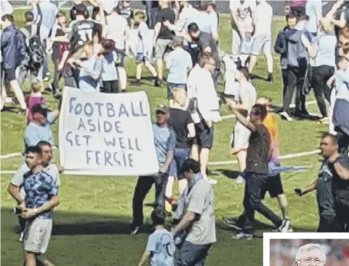  ??  ?? 0 Football rivalry is forgotten as fans of Manchester City at the Etihad Stadium send a get well message to Sir Alex Ferguson, right, former manager of their fierce local rivals Manchester United