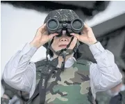  ?? ?? AN EYE FOR DIPLOMACY: Taiwan President Tsai Ing-wen oversees a military drill during the Han Kuang annual exercise in this 2017 file photo.