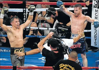  ?? Picture: GETTY IMAGES ?? FINAL COUNTDOWN: Gennady Golovkin and Canelo Alvarez both celebrate after the final round in their epic WBC, WBA and IBF middleweig­ht championio­nship bout at T-Mobile Arena at the weekend in Las Vegas