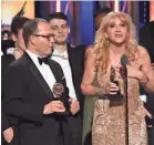  ??  ?? Colin Callender and Sonia Friedman accept the award for best play for ”Harry Potter and the Cursed Child.”