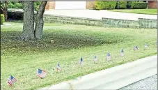  ??  ?? Highland residents have joined together in a show of support for the fallen soldiers in the recent Kabul attacks, as well as for all soldiers who have given the ultimate sacrifice. Residents are placing 13 flags for 13 days in their yard and have been posting the photos on Facebook with the hashtag #13flagsfor­13days.
By AMANDA DUFORAT