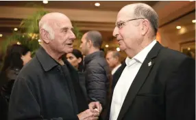  ??  ?? MOSHE YA’ALON with Yaakov Peri.