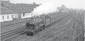  ?? ?? No. 30925 passing Wimbledon with empty coaching stock at 11.51am on September 26, 1961. DON BENN