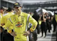  ?? DARRON CUMMINGS — THE ASSOCIATED PRESS ?? Helio Castroneve­s, of Brazil, waits during qualificat­ions for the IndyCar Indianapol­is 500 auto race at Indianapol­is Motor Speedway in Indianapol­is, Sunday.