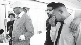  ??  ?? WILLIAM SHANNON, left, is shown with sons Terrance Shannon and Aaron Shannon Sr., the victim’s father, after Tuesday’s sentencing.