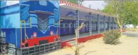  ?? HT PHOTO ?? Five classrooms are painted to look like a train. The boundary wall looks like a goods train, with wagons loaded with inspiratio­nal messages for young minds.