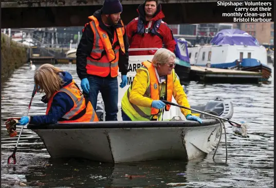  ??  ?? Shipshape: Volunteers carry out their monthly clean-up in Bristol Harbour