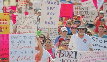  ?? BUTCH DILL/AP ?? Demonstrat­ors against Alabama’s new abortion restrictio­ns protest Sunday in Montgomery, Ala.