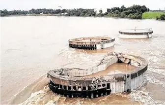  ?? Courtesy Harris County ?? Heavy rains brought by Harvey eroded part of the temporary cap meant to contain dioxin, which is highly toxic and can cause cancer as well as liver and nerve damage.