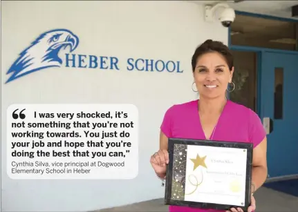  ?? VINCENT OSUNA PHOTO ?? Dogwood School and Heber School Vice Principal Cynthia Silva poses with her 2017 Administra­tor of the Year award outside of Heber School on Thursday afternoon.