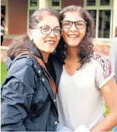  ??  ?? Pictured is Nandini Lad and her proud mum. Nandini got three A*s in Physics, Mathematic­s and Chemistry and B in her EPQ.