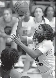  ?? Arkansas Democrat-Gazette/THOMAS METTHE ?? puts up a shot during the fourth quarter of the Trojans’ 63-44 victory Thursday against Louisiana-Monroe at the Jack Stephens Center in Little Rock. DeGray had 23 points in UALR’s first victory on its home floor since Nov. 14.