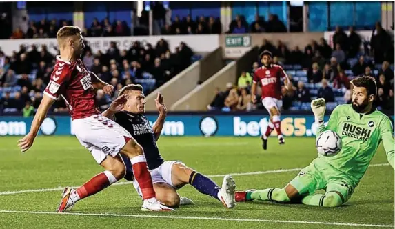  ?? Pictures: Rogan Thomson/JMP ?? Bristol City’s Andi Weimann has a shot blocked by Millwall goalkeeper Bartosz Bialkowski