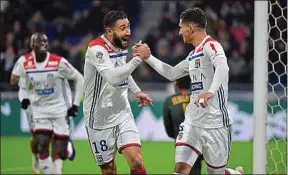  ??  ?? Fekir et Aouar ont inscrit les deux premiers buts de l’OL contre Monaco.