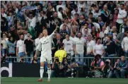  ?? Picture: AP Photo ?? TOP FORM: Real Madrid’s Cristiano Ronaldo celebrates scoring the opening goal of his hat-trick.