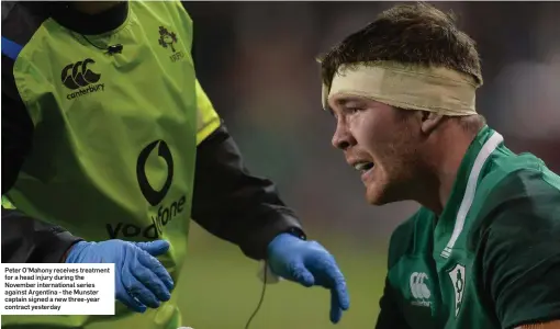  ??  ?? Peter O’Mahony receives treatment for a head injury during the November internatio­nal series against Argentina - the Munster captain signed a new three-year contract yesterday