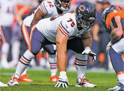  ?? JACK DEMPSEY/AP ?? Right guard Kyle Long (75) was lost for the season after Week 5 because of a hip injury, forcing Rashaad Coward into the lineup and creating more line shuffling.