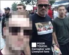  ?? EXCLUSIVE ?? POOR TOUCH: Carragher with Liverpool fans