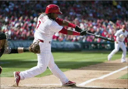  ?? CHRIS SZAGOLA — THE ASSOCIATED PRESS ?? The Philadelph­ia Phillies’ Maikel Franco hits a two run single during the first inning of a baseball game against the Miami Marlins, Thursday in Philadelph­ia.