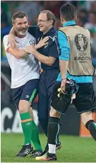  ??  ?? Pure joy: O’Neill celebrates with Keane (left) as Gianluigi Buffon offers congratula­tions GETTY IMAGES