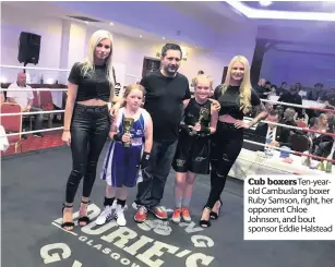  ??  ?? Cub boxersTen-yearold Cambuslang boxer Ruby Samson, right, her opponent Chloe Johnson, and bout sponsor Eddie Halstead