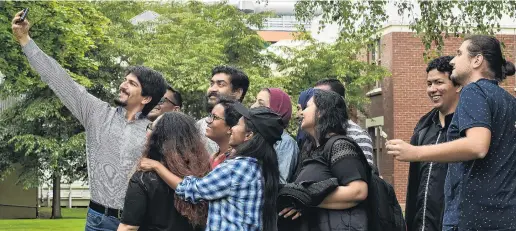  ?? PHOTO: GREGOR RICHARDSON ?? Internatio­nal students . . . University of Otago students from India, Iran, Sri Lanka, Pakistan, Mexico and Turkey attending a Summer School orientatio­n event on the University Union lawn yesterday celebrate with a selfie.