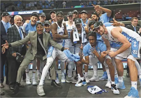  ?? NELSON CHENAULT, USA TODAY SPORTS ?? North Carolina players celebrate their South Region title and return to the Final Four. The Tar Heels lost in the 2016 title game.