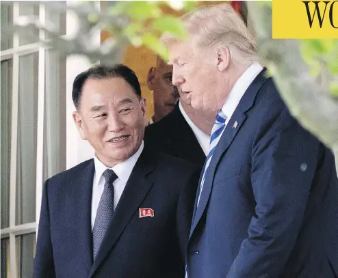  ?? ANDREW HARNIK / THE ASSOCIATED PRESS ?? President Donald Trump talks with Kim Yong Chol, former North Korean military intelligen­ce chief and one of leader Kim Jong Un’s closest aides, as they walk from their meeting in the Oval Office of the White House on Friday.