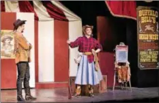  ??  ?? KATHY SANDHAM Andrew Kotlar, as Frank Butler, and Elyse Mulvaney, as Annie Oakley, perform in the Geauga Lyric Theater Guild production of “Annie Get Your Gun” at Geauga Theater.