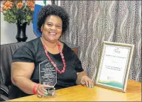  ?? Picture: SUPPLIED ?? TOP HONOUR: Roads and public works MEC Thandiswa Marawu holds the gold award the department received for best internship programme