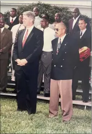  ?? ?? President Bill Clinton and Josh Culbreath during a ceremony recognizin­g Culbreath’s Central State track team.