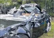  ?? National Transporta­tion Safety Board ?? THE MODEL S sedan involved in a fatal May 2016 crash. With its Autopilot engaged, the car went under a turning big-rig truck, killing the Tesla’s driver.