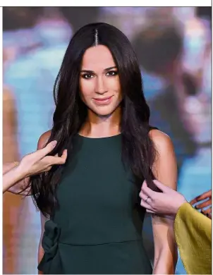  ?? — Reuters ?? Like real: The wax figure of Markle on display at Madame Tussauds in London. The waxworks of Harry and Markle will go on public show a day before the wedding.