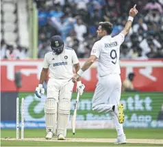  ?? ?? James Anderson celebrates taking the wicket of Rohit Sharma