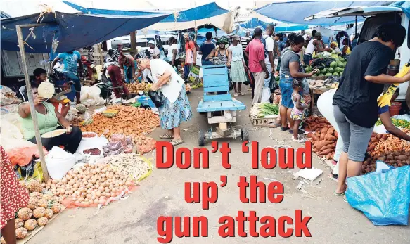  ?? PHOTOS BY JERMAINE BARNABY/FREELANCE PHOTOGRAPH­ER ?? It’s business as usual as vendors at the Coronation Market display and sell ground provisions next to the bloodstain­s where their colleagues were murdered less than a day later.