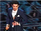  ??  ?? Director Damien Chazelle delivers a speech on stage after he won the Best Director award for ‘La La Land’.