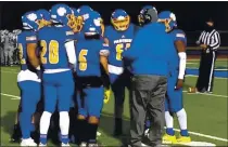  ?? MATT O’DONNELL — TIMES-HERALD ?? The Benicia High football team huddles during a timeout on Friday against Acalanes. The Panthers lost 27-21.