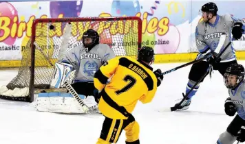  ??  ?? Ollie Barron’s shot hits the top of the net to get the Wild off the mark