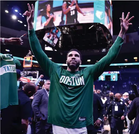  ?? Getty iMaGes ?? FANTASTIC FINALE: Jayson Tatum celebrates as he leaves the court after the Celtics’ 139-110 win against the Memphis Grizzlies at FedExForum on Sunday night.