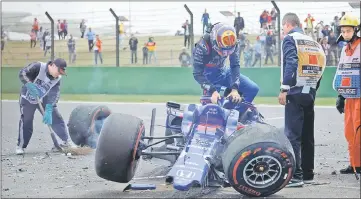  ??  ?? Toro Rosso’s Alexander Albon after crashing during practice. — Reuters photo