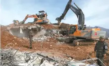  ?? Joint Press Corp ?? A South Korean guard post in Cheorwon, Gangwon Province, is demolished by ground forces here on Nov. 15 last year. The move came as part of an inter-Korean military agreement under which both sides pulled out 10 guard posts on each side along the border area.