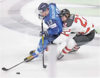  ?? AP PHOTOS ?? Brandon Hagel (top with the Blackhawks, above with Team Canada), grew up in a small town north of Edmonton and was at a crossroads in his hockey career in 2018. But he signed an entry-level deal with the Blackhawks that year and earned a three-year, $4.5 million contract this summer.