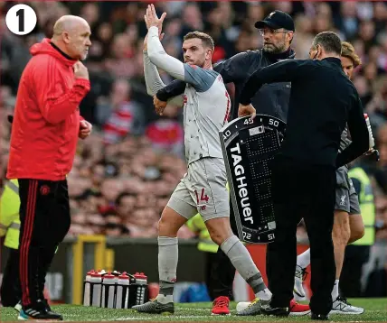  ?? GETTY IMAGES ?? Flashpoint: Henderson claps the fans, blanking Klopp’s attempted handshake 1