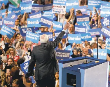  ?? MARK J. TERRILL /ASSOCIATED PRESS ?? Sen. Bernie Sanders waves to his supporters as he prepares to address the first day of the Democratic National Convention.