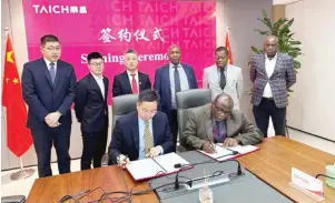  ?? ?? ZESA Enterprise­s (ZENT) acting managing director Dr Godfrey Mugaviri (right) signs a Memorandum of Understand­ing (MOU) with Taich general manager Zhang Shiyu on strategic partnershi­p in transmissi­on steel tower and concrete poles manufactur­ing in the presence of the Minister of Energy and Power Developmen­t Edgar Moyo, ZESA Executive chairman Dr Sydney Gata and Taich board members in Shanghai, China yesterday.