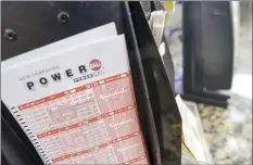  ?? The Brattlebor­o Reformer photo via AP ?? The Powerball jackpot climbed over $1.5 billion on Thursday after no one won Wednesday’s drawing.