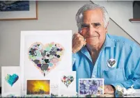  ?? ROBERT F. BUKATY THE ASSOCIATED PRESS ?? Artist Donald Verger has sent about 25,000 postcards of his hearts and landscape photograph­y to schools and hospitals.