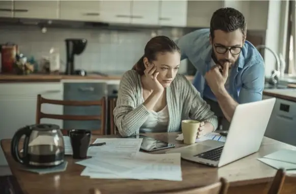  ?? ISTOCK ?? Feeling glum about your financial future? Try taking a hard look at your finances with a profession­al and setting some realistic goals you can actually stick to. It may help improve your outlook.