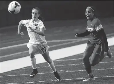  ?? Photo by Ernest A. Brown ?? Talented Lincoln freshman forward Riley Specht (17) chases a ball during the No. 7 Lions’ 1-0 victory over No. 10 Cranston West in a Division I preliminar­y round contest at Ferguson Field Wednesday night.