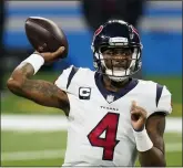  ?? PAUL SANCYA — THE ASSOCIATED PRESS ?? Houston Texans quarterbac­k Deshaun Watson throws during the second half of Thursday’s game with the Detroit Lions.